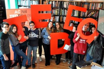 Students with Big Red Letters