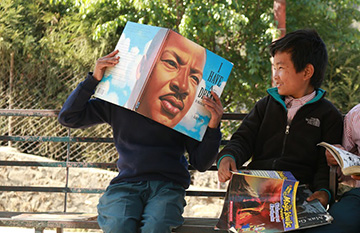 Two children with books